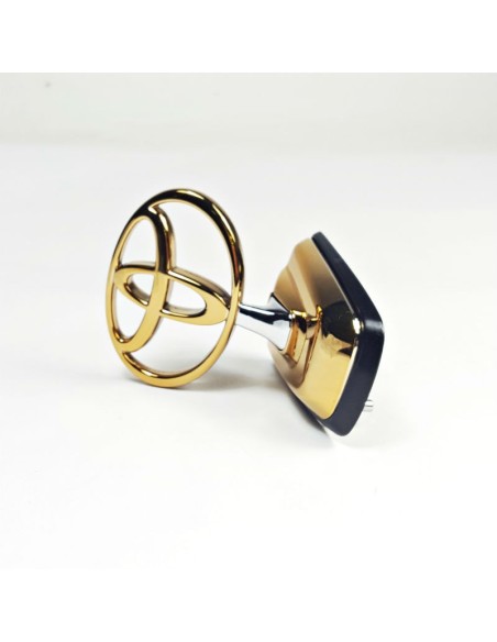 LOGO CAPO DELANTERO  J10  (DORADO) ORIGINAL TOYOTA LAND CRUISER