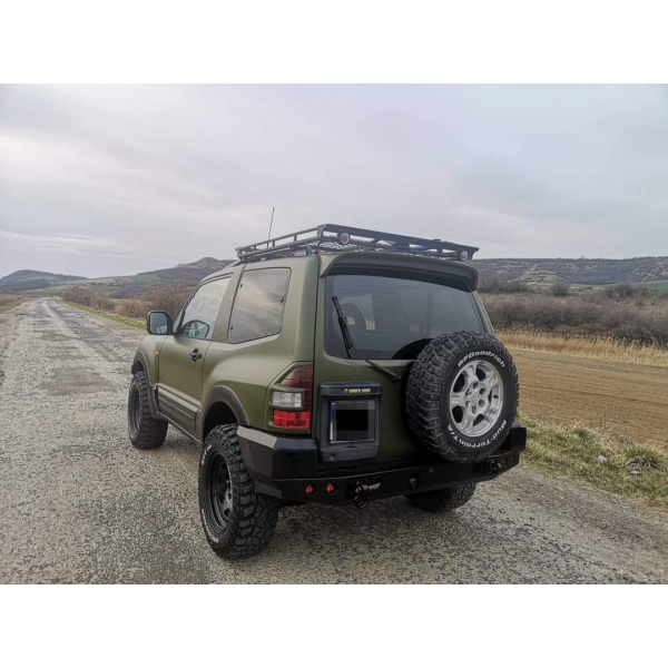 Rear bumper made of reinforced steel for...