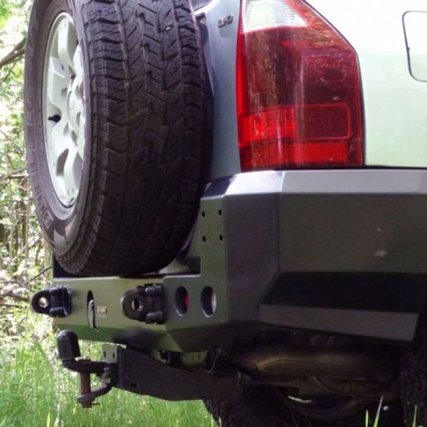 Rear bumper made of reinforced steel for...