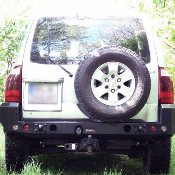 Rear bumper made of reinforced steel for...