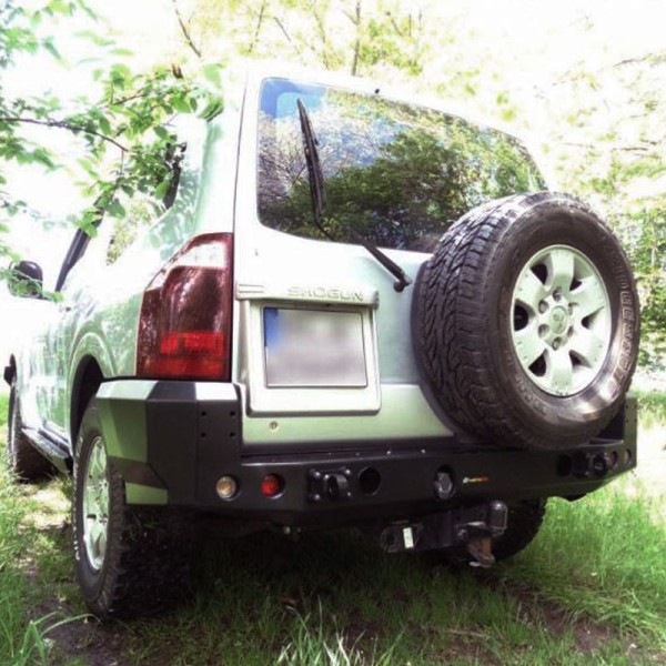 Rear bumper made of reinforced steel for...