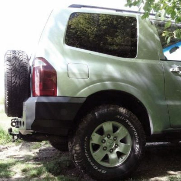 Rear bumper made of reinforced steel for...
