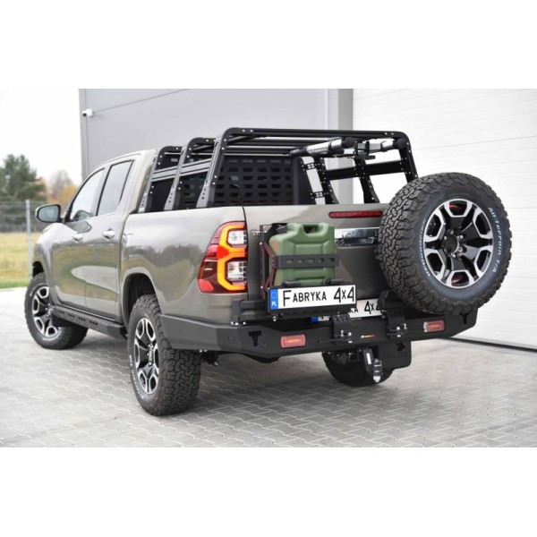 Long rear bumper made of reinforced steel with...