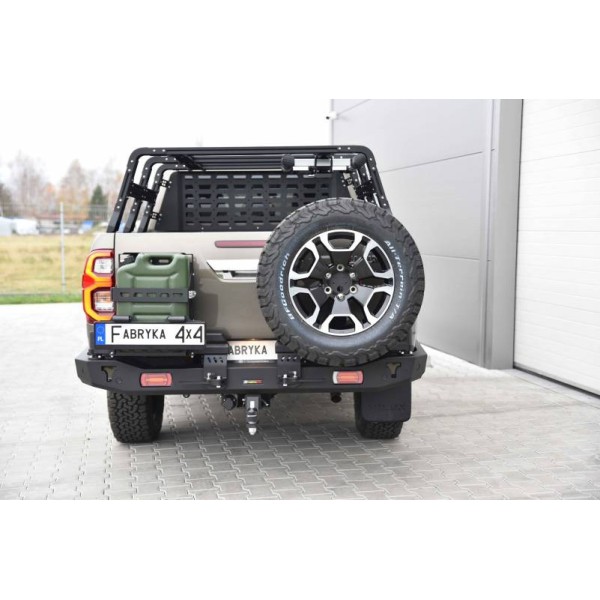 Long rear bumper made of reinforced steel with...