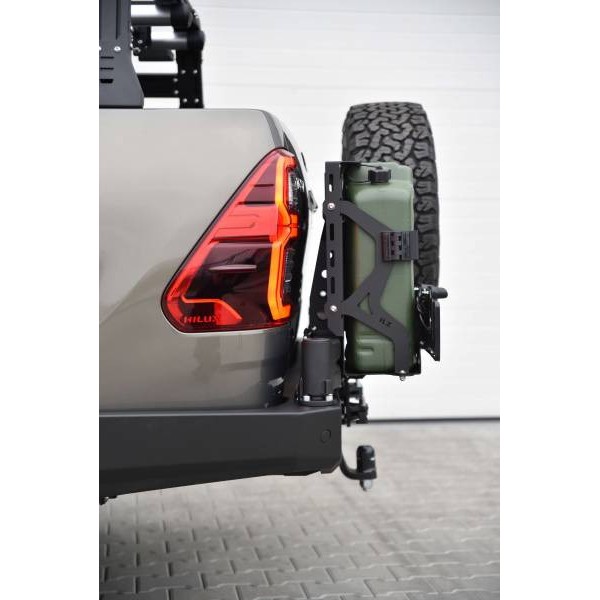 Long rear bumper made of reinforced steel with...
